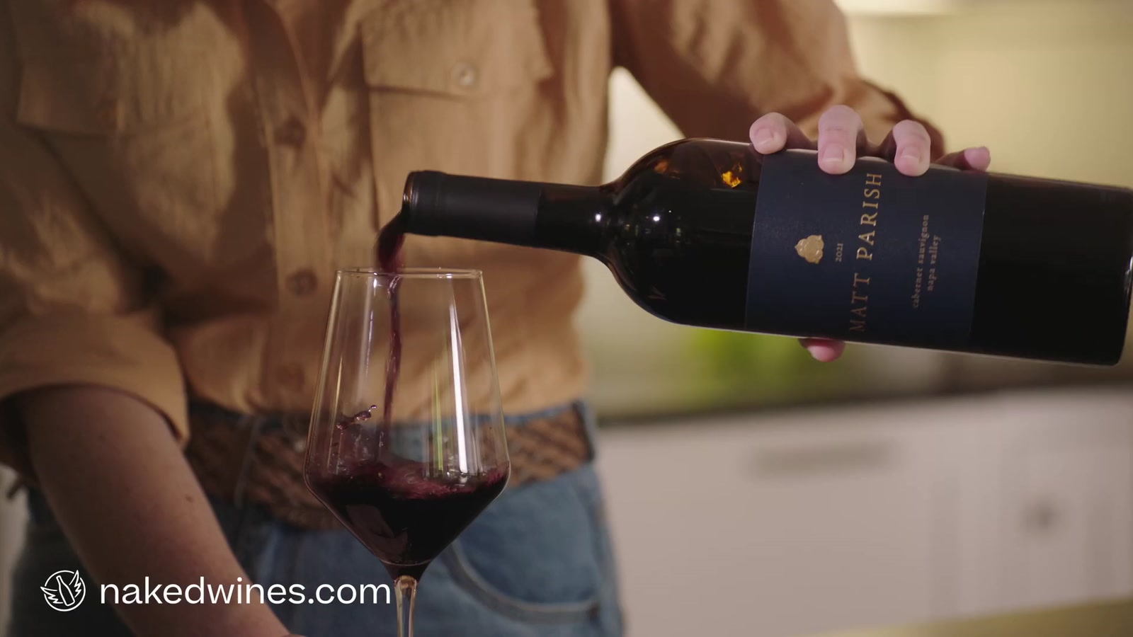 Red wine being poured into a glass in the Naked Wines film